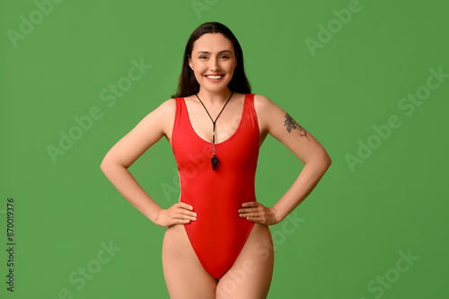 Female lifeguard with whist...