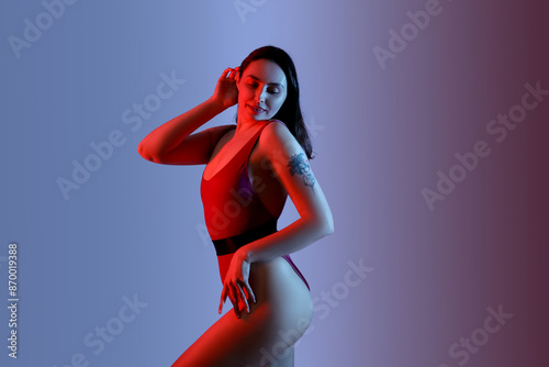 Pretty young woman in swims...