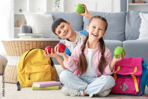 Little schoolchildren with ...