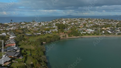 Tindalls beach and resifential housing in Whangaparoa, Auckland, New Zealand. photo