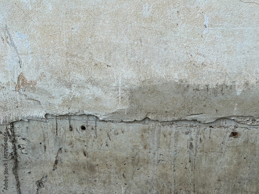 Obraz premium texture of a concrete wall with cracks and scratches which can be used as a background