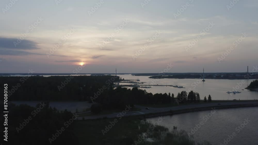 Aerial view of the scenic shore of Vasklot under a sunset sky Aerial view of the scenic shore of Vasklot under a sunset sky