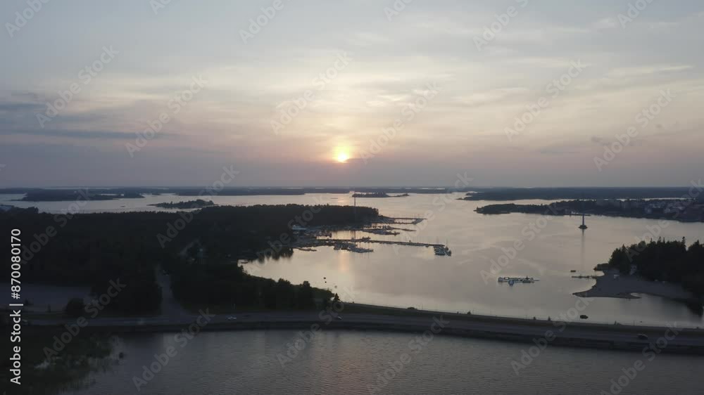 Aerial view of the scenic shore of Vasklot under a sunset sky Aerial view of the scenic shore of Vasklot under a sunset sky