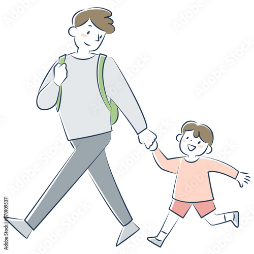 手をつないで歩く男の子と父親