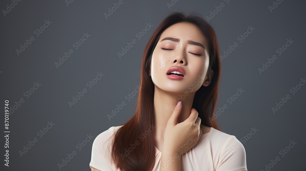 Woman with Closed Eyes Touching her Throat Woman with Closed Eyes Touching her Throat