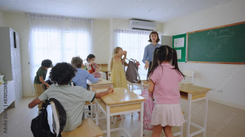 Back to school of adorable student entering classroom at elementary school. Back to school of adorable student entering classroom at elementary school.