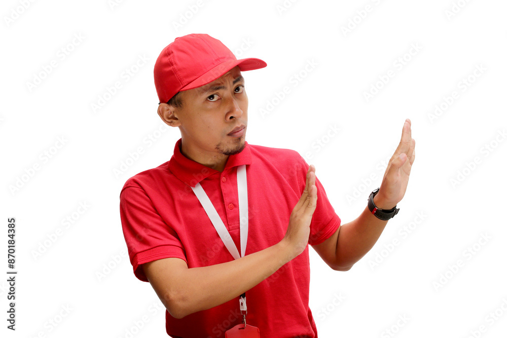 Asian Delivery man or courier is making a firm STOP gesture with his hand, signaling refusal, prohibition, and warning, isolated on a white background Asian Delivery man or courier is making a firm STOP gesture with his hand, signaling refusal, prohibition, and warning, isolated on a white background