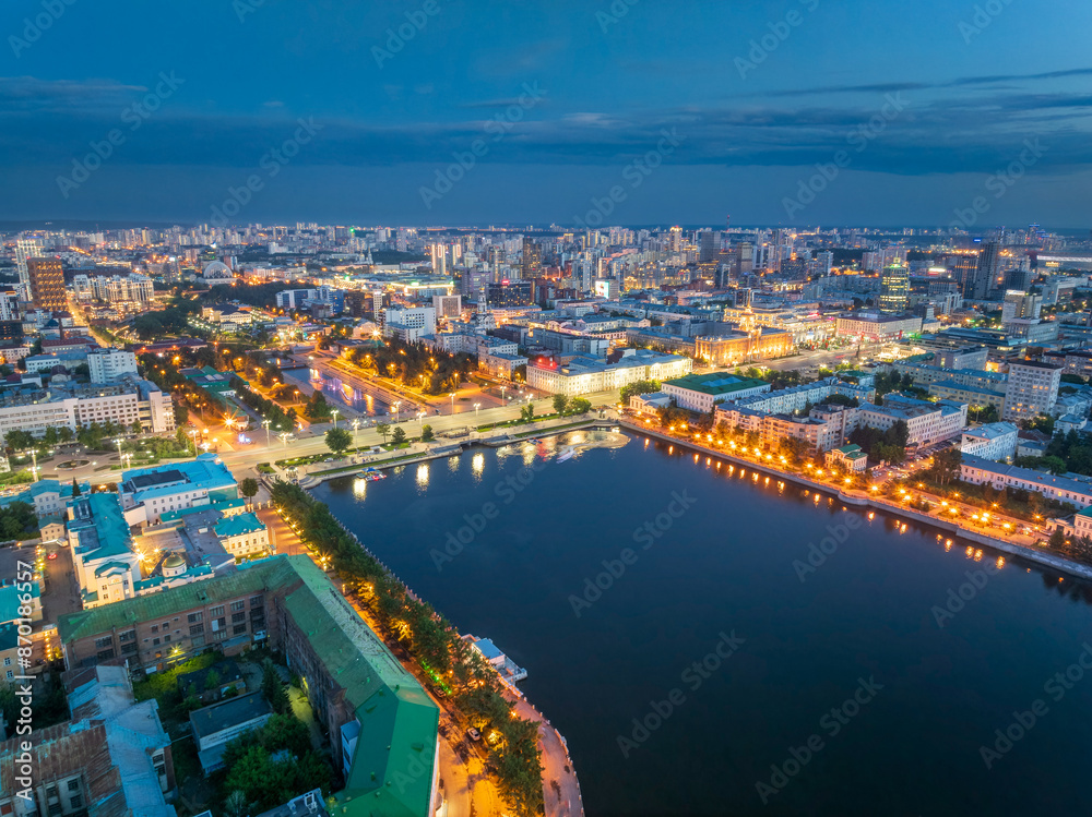 Fototapeta premium Embankment of the central pond and Plotinka in Yekaterinburg at summer or early autumn night. The historic center of the city of Yekaterinburg, Russia, Aerial View