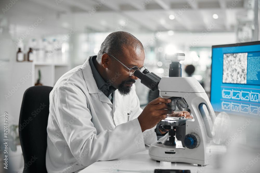 Science, black man and development with microscope in lab for investigation, research and dna test. Mature scientist, innovation and biotech with review for stem cell, growth or report in vaccinology Science, black man and development with microscope in lab for investigation, research and dna test. Mature scientist, innovation and biotech with review for stem cell, growth or report in vaccinology