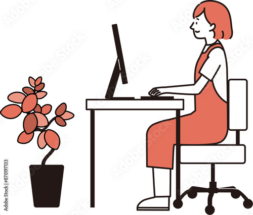 パソコンを使っているエプロン姿の女性のイラスト