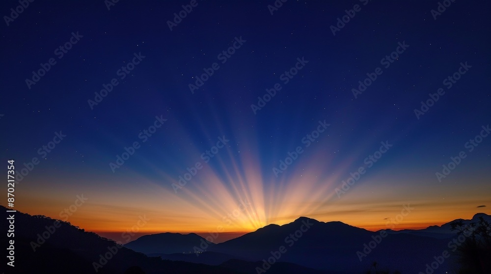 The first light of dawn spreading across the sky, gradually banishing the darkness, heralds the start of a new day with promise and hope.