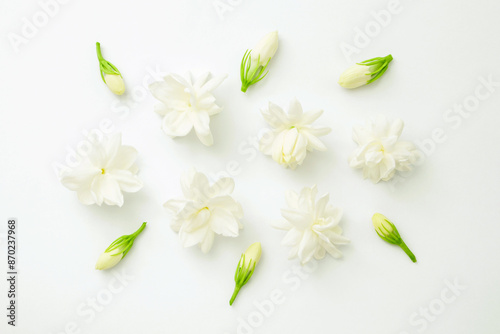 Group jasmine flower on white paper background , top view , flat lay.