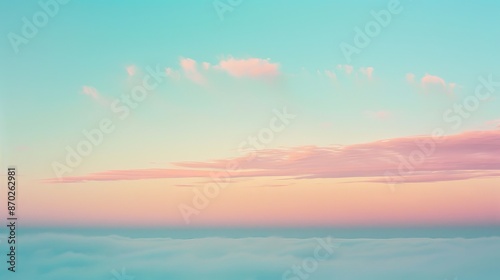 Clear sky at dawn with the first light of the sun, soft pastel colors and a serene atmosphere, photography