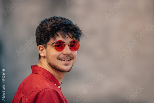 young man with sunglasses on the street