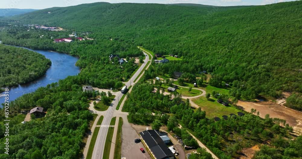 Drone tracking a truck driving through the Utsjoki village, summer in Finland Drone tracking a truck driving through the Utsjoki village, summer in Finland