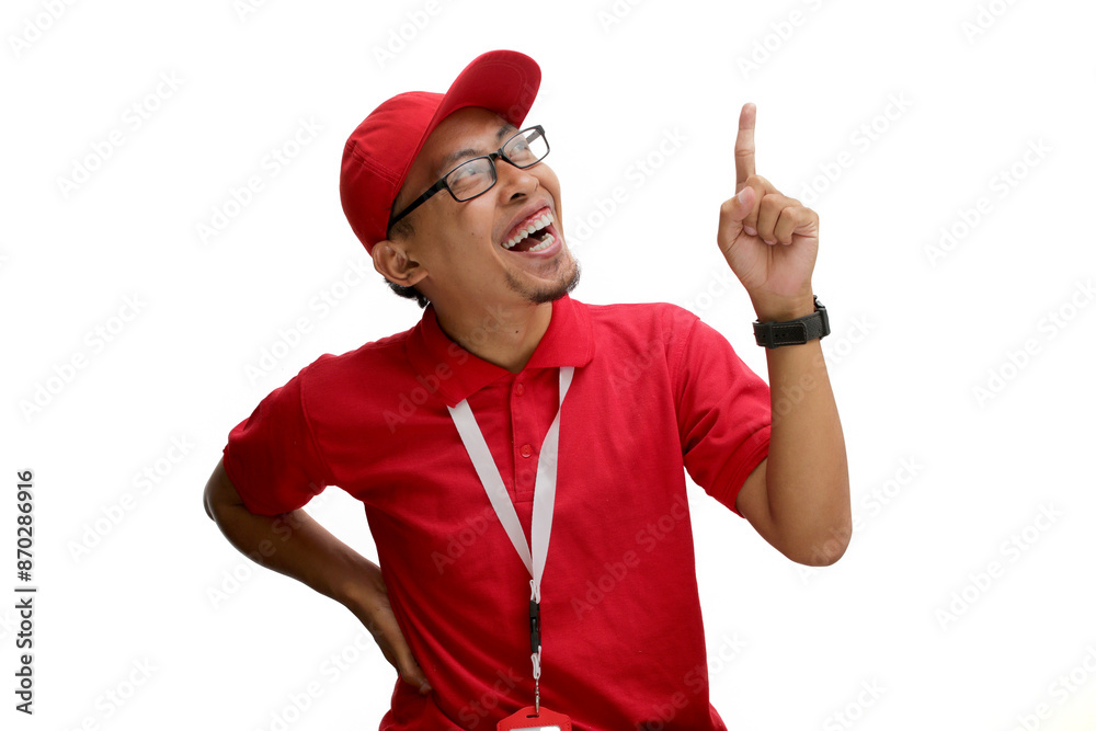 Happy Asian delivery man or courier is captured in a eureka moment, pointing up with an excited expression as if having a revelation or brilliant idea. Isolated on a white background Happy Asian delivery man or courier is captured in a eureka moment, pointing up with an excited expression as if having a revelation or brilliant idea. Isolated on a white background