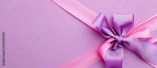 Purple ribbon rolled with a...