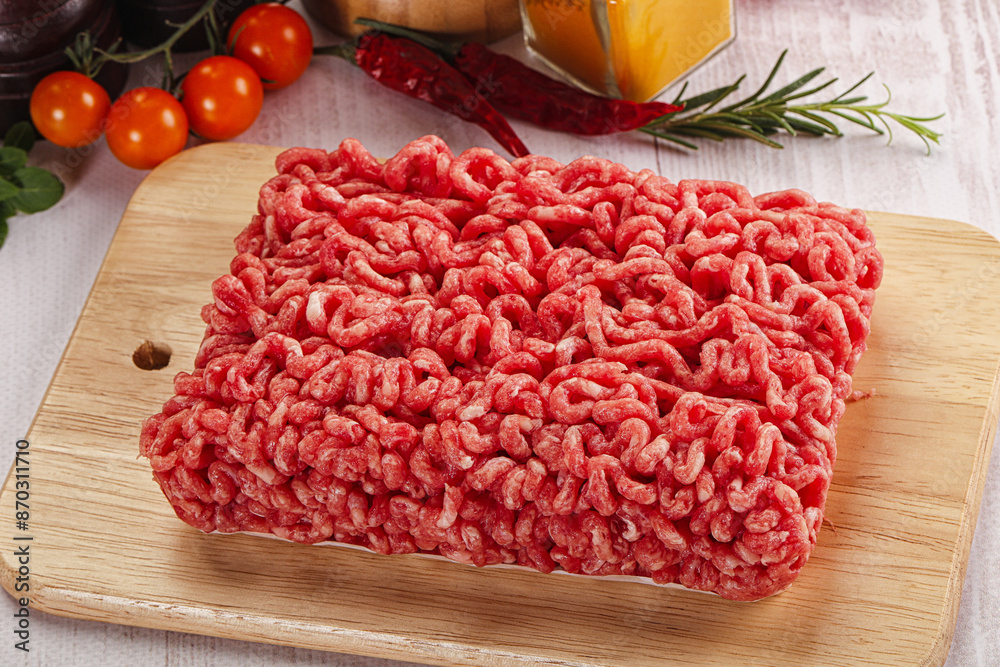 Raw minced beef meat over board Raw minced beef meat over board