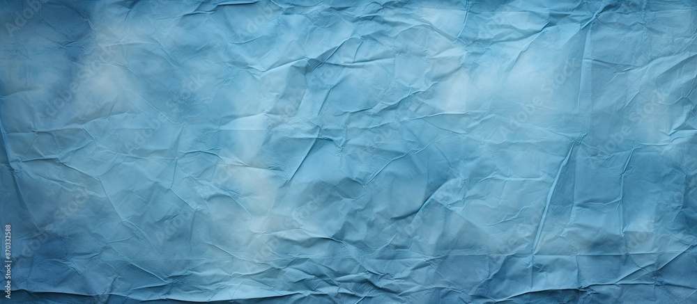 Obraz premium Textured background of crumpled blue grunge paper with copy space image.