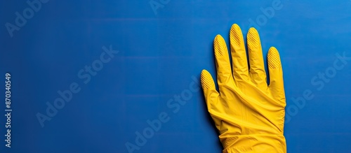 Blue protective glove on ye...