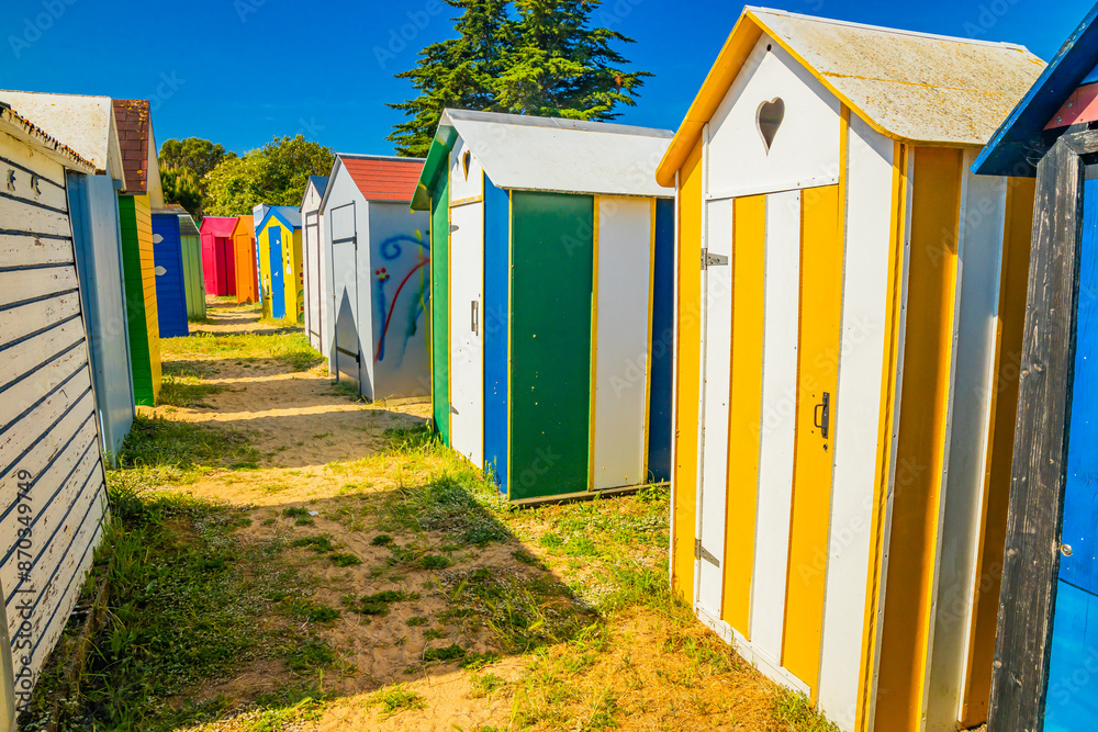 Naklejka premium Painted beach huts of the beach of La Boirie on Oleron island in summer