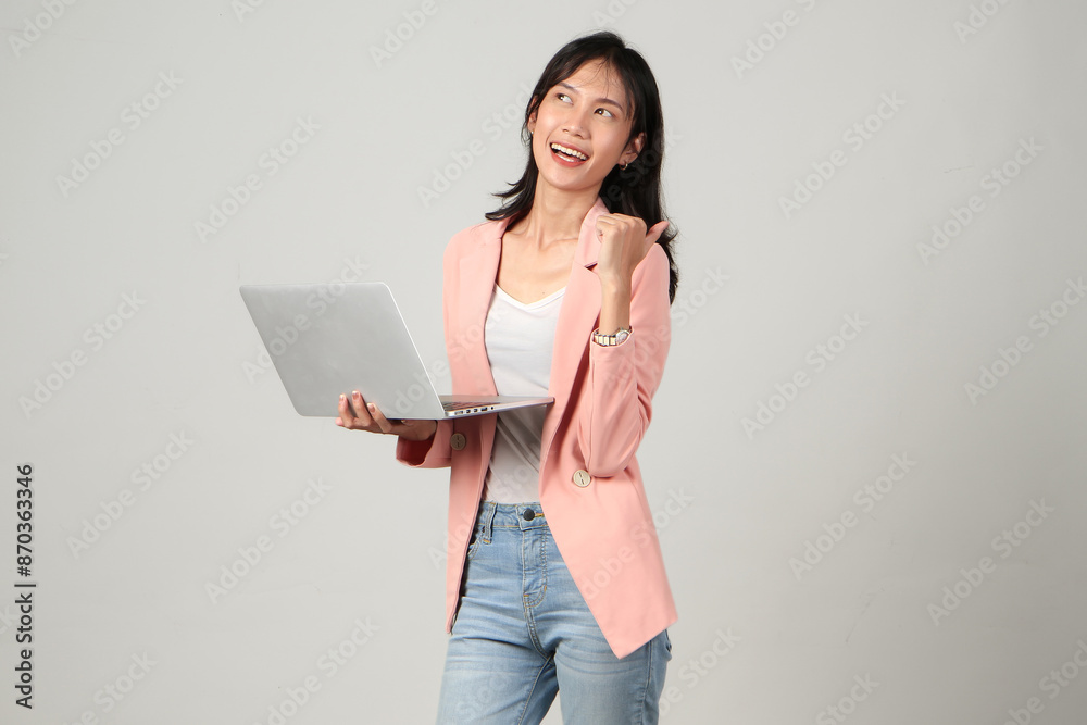 happy asian woman wearing formal casual outfit holding laptop camputer giving thumb up on isolated background happy asian woman wearing formal casual outfit holding laptop camputer giving thumb up on isolated background