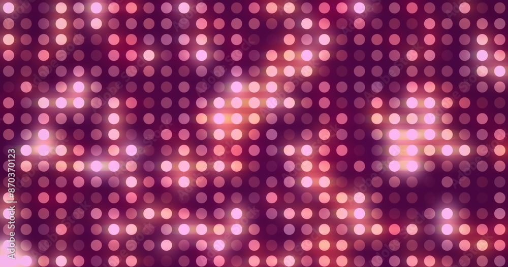Image of grid of twinkling pink and orange circular lights Image of grid of twinkling pink and orange circular lights