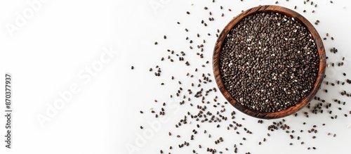 A view from above of chia seeds on a clear white background with ample copy space image.