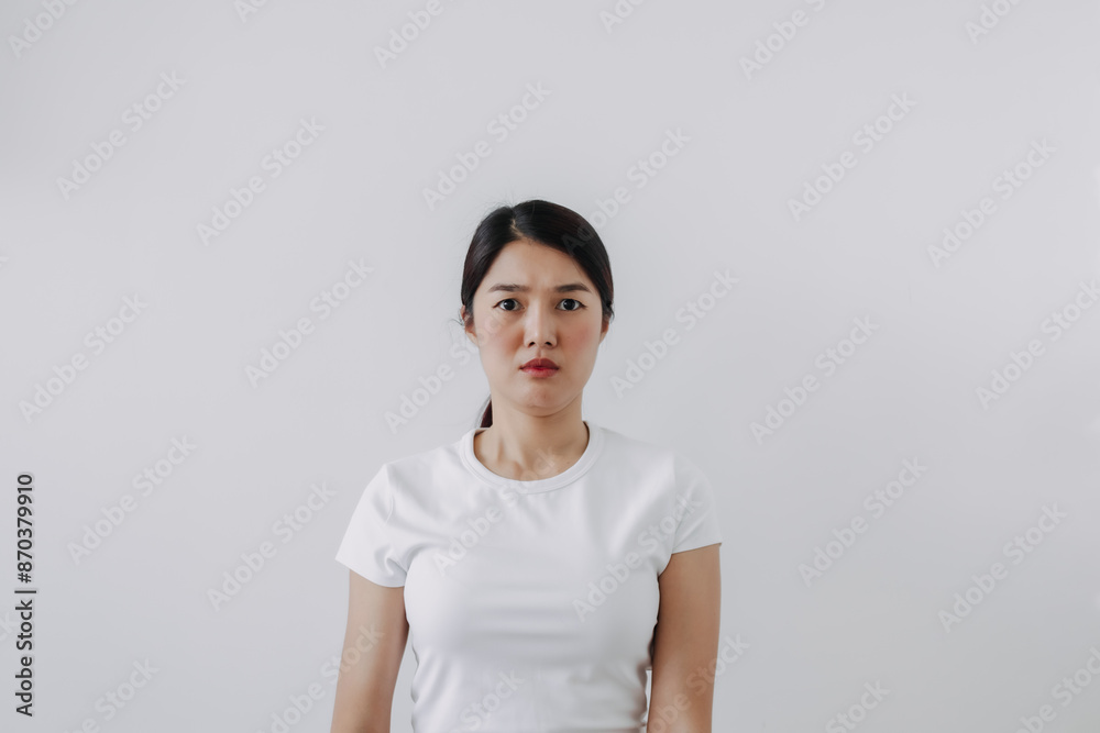 Asian Thai woman doubt and curious face, have question thinking and looking at camera, isolated on white background wall. Asian Thai woman doubt and curious face, have question thinking and looking at camera, isolated on white background wall.
