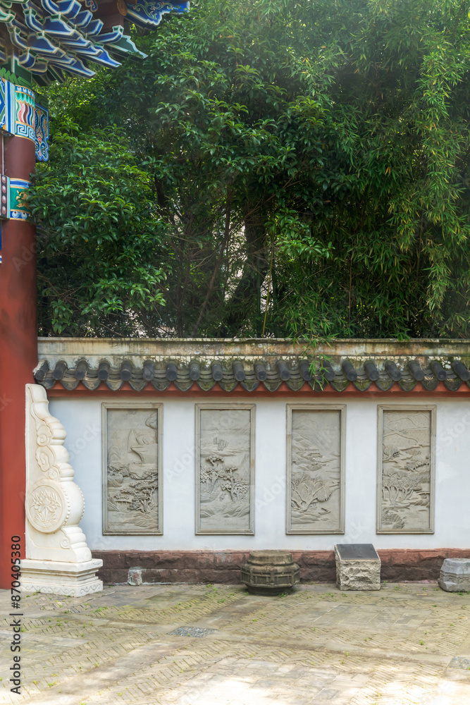 A detailed stone carving decorating a wall in China A detailed stone carving decorating a wall in China