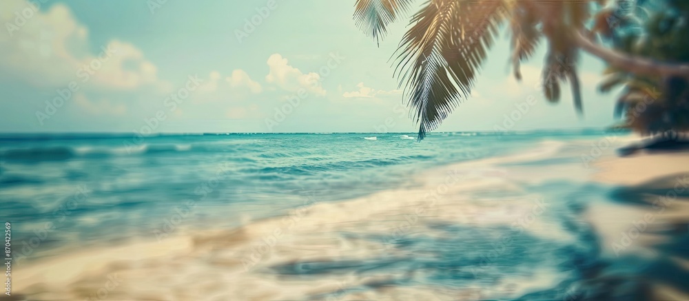 Fototapeta premium Copy space image of a vintage blue-toned blurred tropical beach background, creating a summer vibe for a travel and adventure concept.