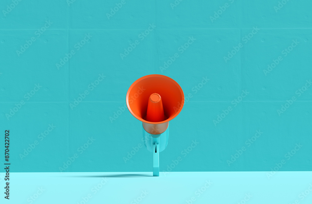 Orange megaphone standing on blue background is making announcement Orange megaphone standing on blue background is making announcement