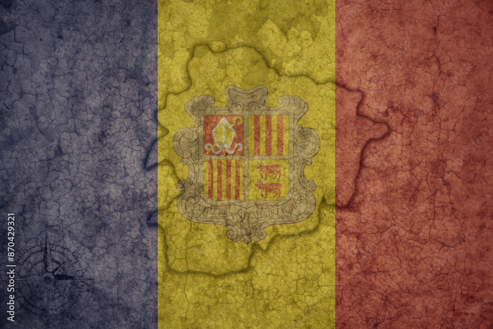 Fototapeta premium map and flag of andorra on a old vintage crack paper background .