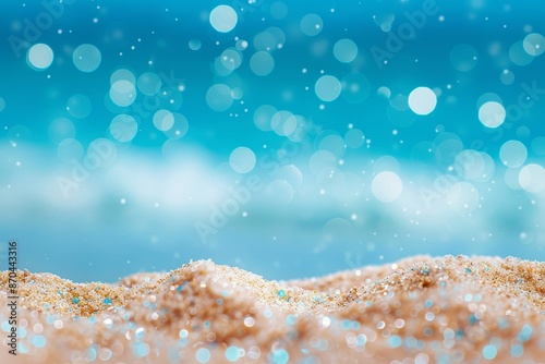 An abstract beach landscape with bokeh light highlighting the sand foreground.