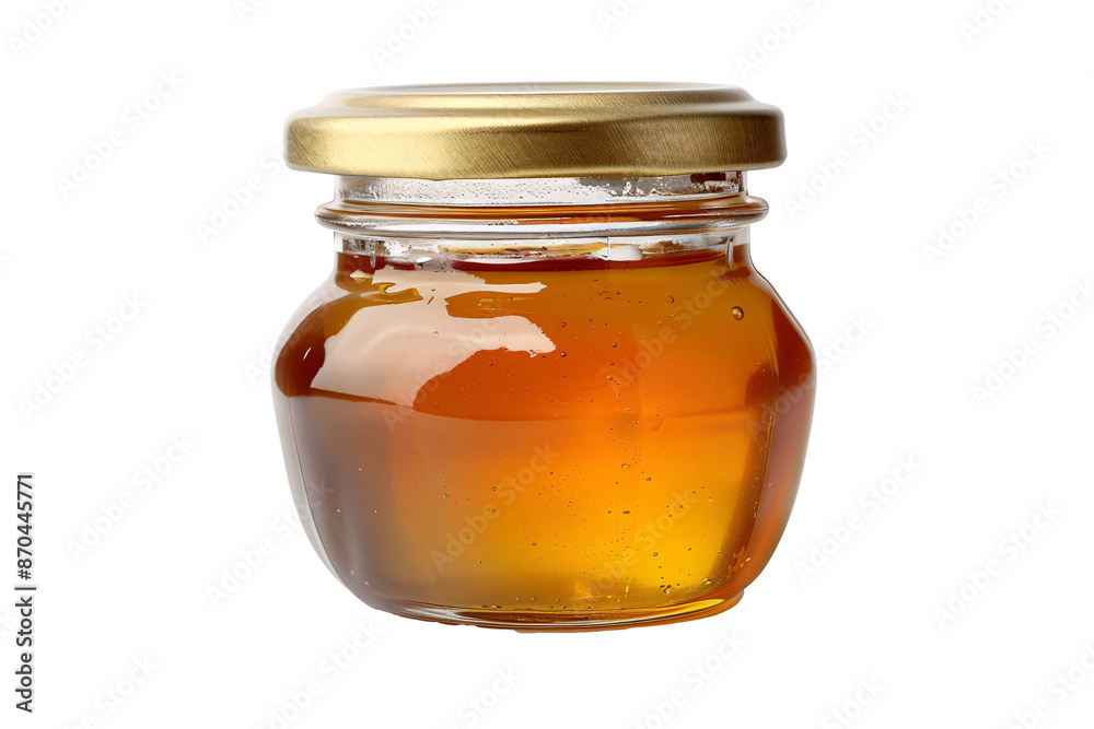 a jar of honey with a gold lid a jar of honey with a gold lid