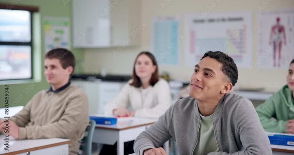 Boy, hand raised and learning in classroom at high school with question, opinion or answer for quiz. Student, teenager and happy for education, scholarship and development for confidence at academy Boy, hand raised and learning in classroom at high school with question, opinion or answer for quiz. Student, teenager and happy for education, scholarship and development for confidence at academy