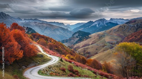 Breathtaking Autumn Mountain Landscape at Sunset with Winding Road