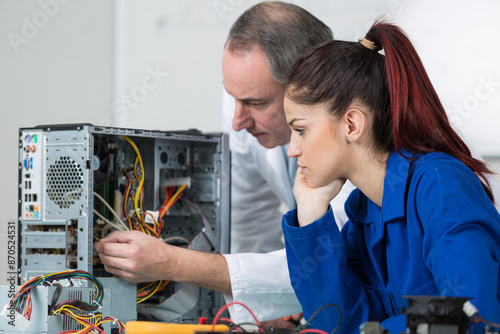 Wallpaper Mural young woman fix pc component with teacher Torontodigital.ca