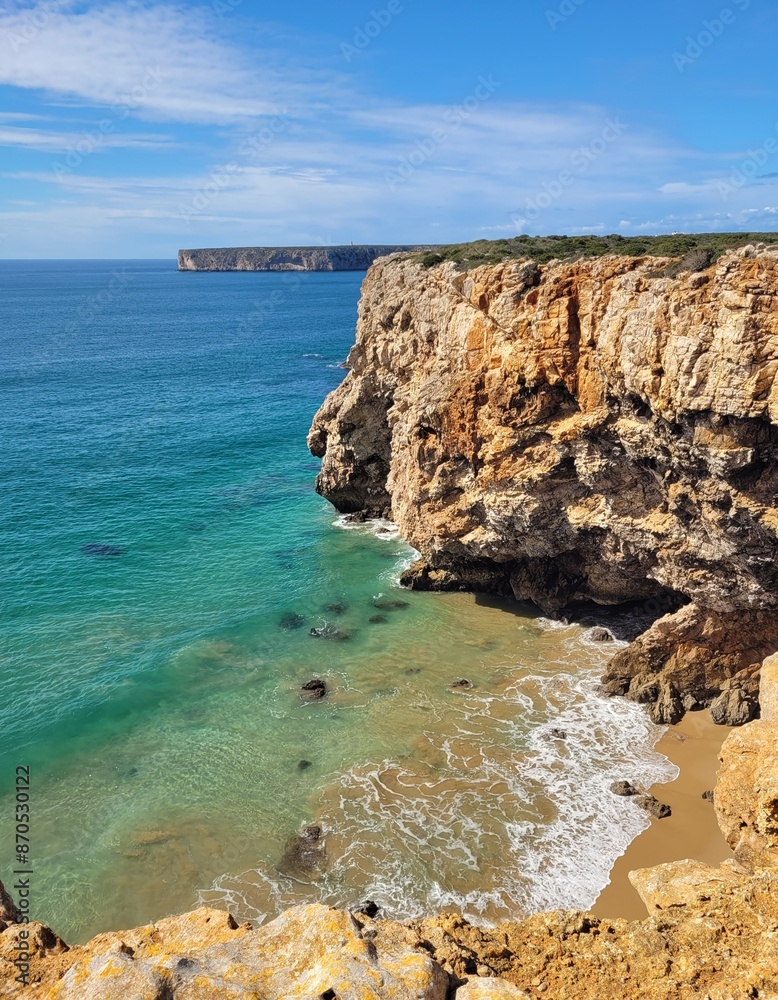 Fototapeta premium Cliffs and turquoise water from above, Algarve, Portugal