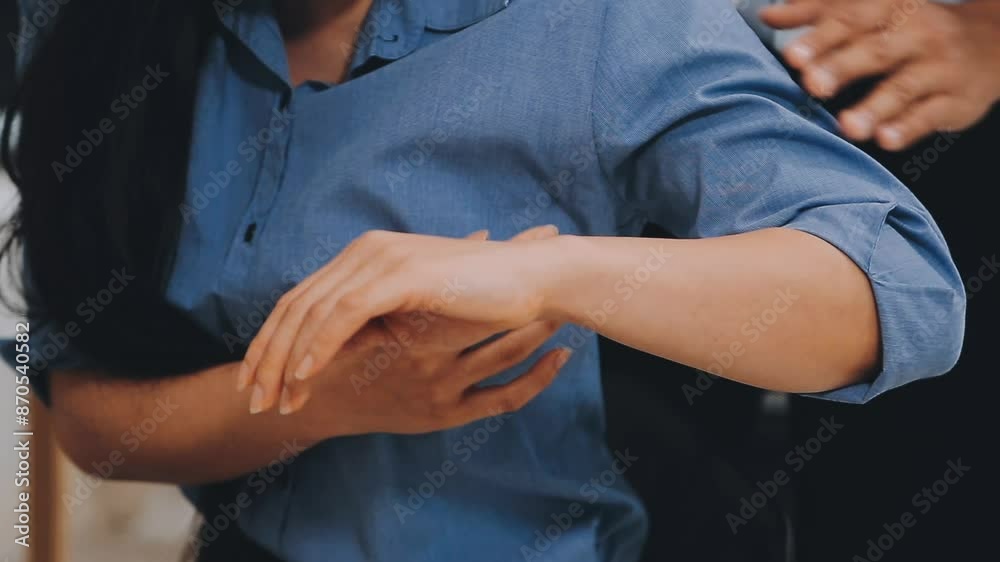 Doctor or Physiotherapist working examining treating injured arm of athlete male patient, stretching and exercise, Doing the Rehabilitation therapy pain in clinic. Doctor or Physiotherapist working examining treating injured arm of athlete male patient, stretching and exercise, Doing the Rehabilitation therapy pain in clinic.