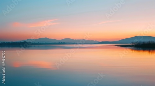 Serene Lakeside Dusk: Captivating Sunset Reflection on Water Surface