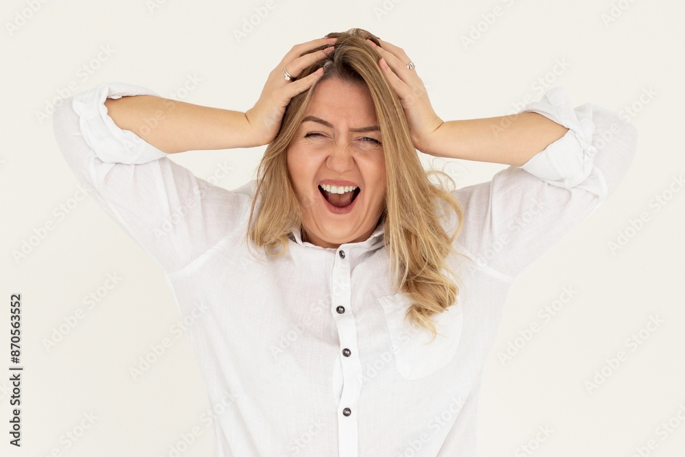 Photo of shocked afraid cute girl open mouth hands head wear white shirt isolated white background Photo of shocked afraid cute girl open mouth hands head wear white shirt isolated white background