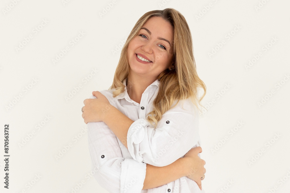 I love myself. Portrait of self-satisfied egoistic woman embracing herself and smiling with pleasure, feeling self-pride. Studio shot isolated on white background I love myself. Portrait of self-satisfied egoistic woman embracing herself and smiling with pleasure, feeling self-pride. Studio shot isolated on white background