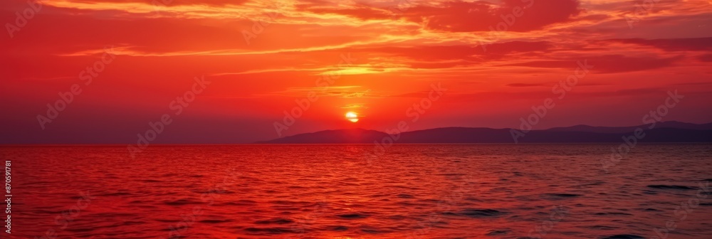Fototapeta premium Fiery Sunset Over the Sea