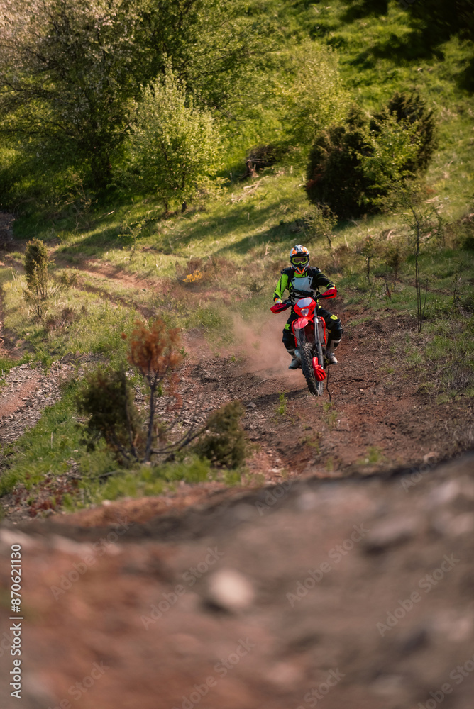 Fototapeta premium Professional enduro bike rider on action. Motocross sport.