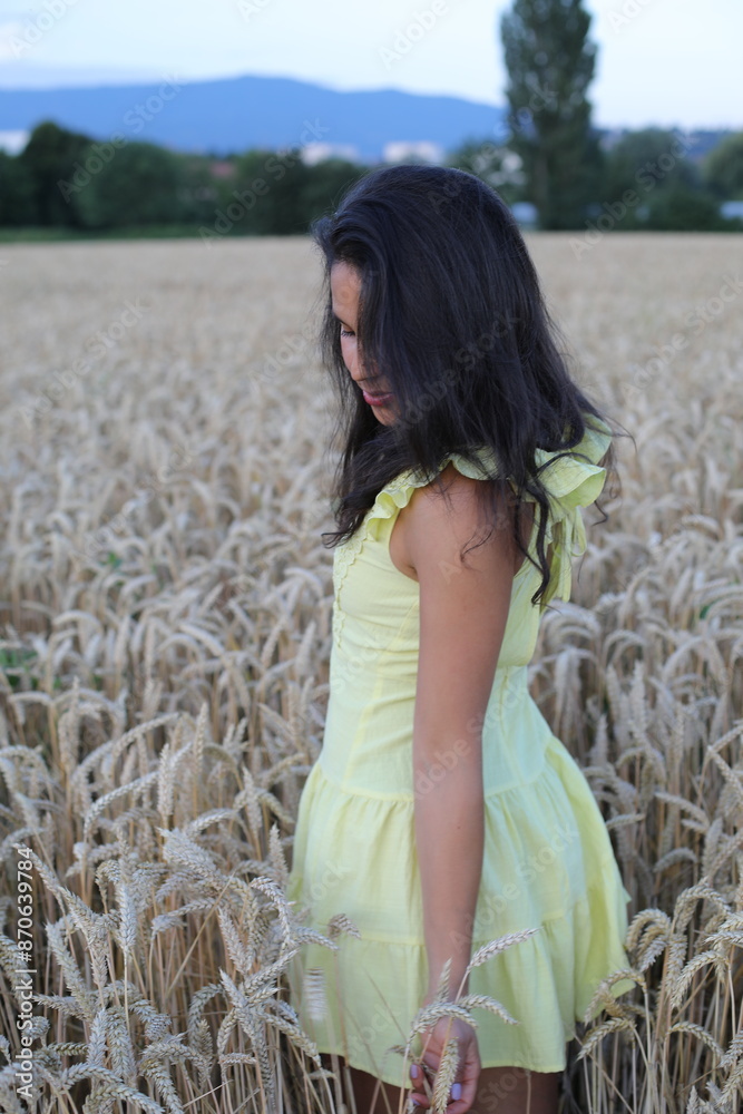 Pretty female in stunning wheat field Pretty female in stunning wheat field