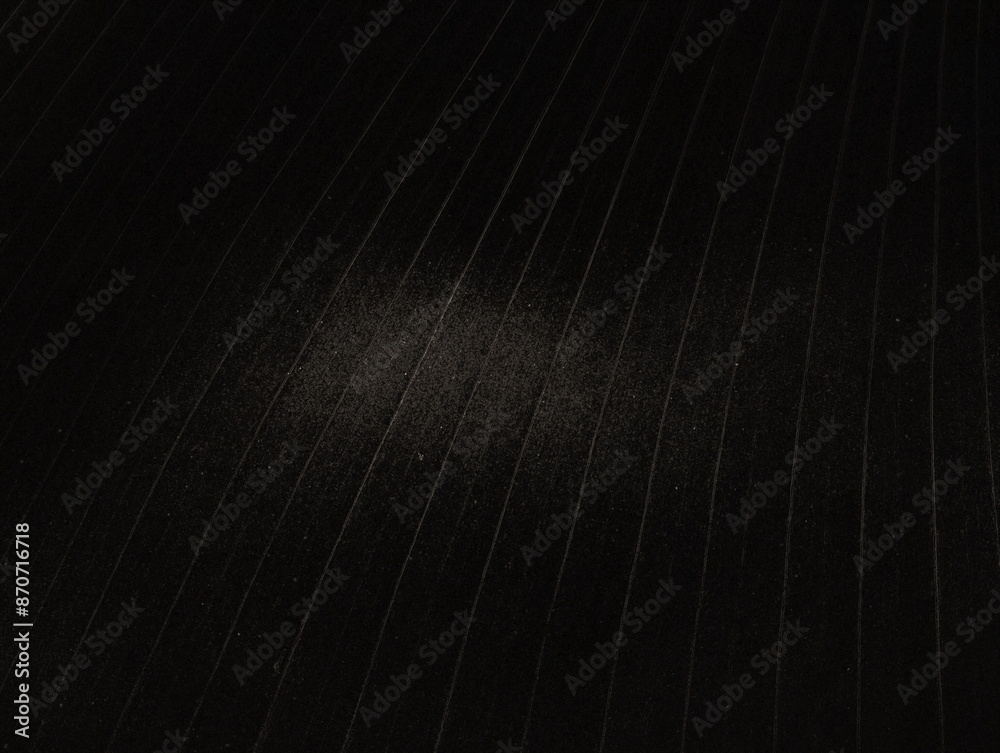 Dust particles on the black surface have lines. Dust particles on the black surface have lines.