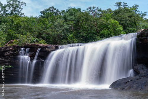 Fototapeta Naklejka Na Ścianę i Meble -  Wang Yai waterfall, Waterfalls, and rivers in Beautiful nature, Sisaket province, Thailand.The source of the river in the forest. waterfall with forest in the background.