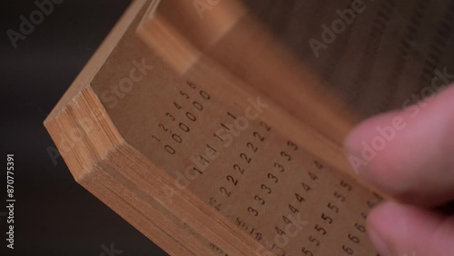 Deck of vintage punch cards in hands close-up