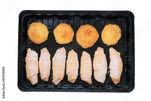 Cookies set in black box. Isolated on white background. Diversity of bakery. Takeaway. Top view.